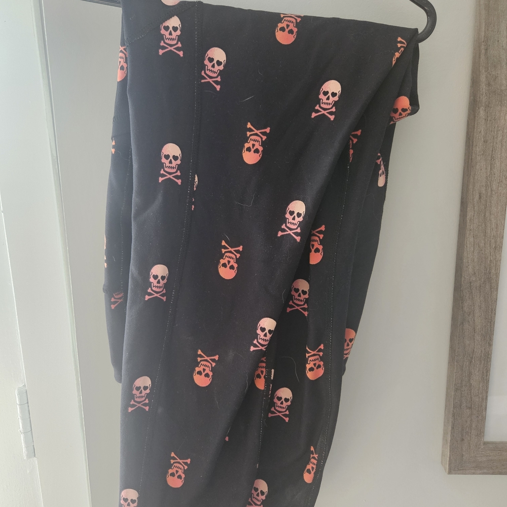 Torrid Black Leggings with Pink Skull Design